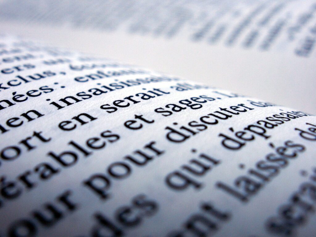 An open book of French text