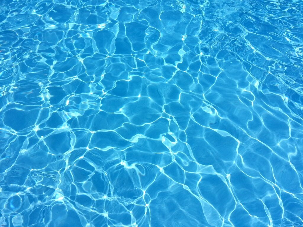 A rippling pool of blue water