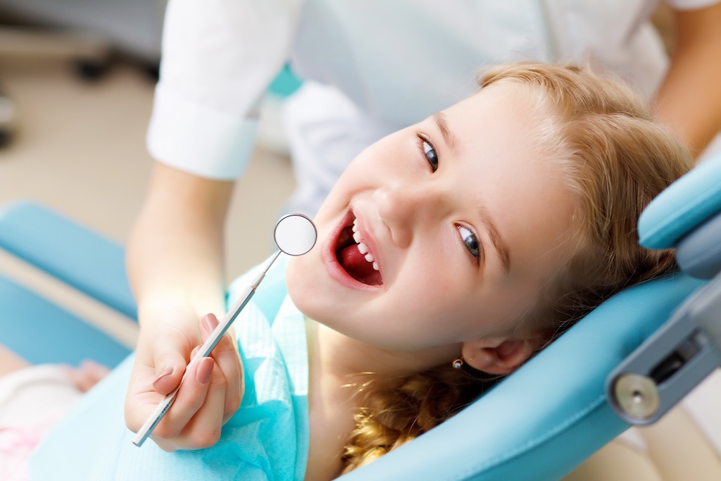 Child in dentist chair